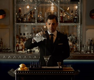 Mixologist creating the perfect martini at The Connaught Bar in Mayfair