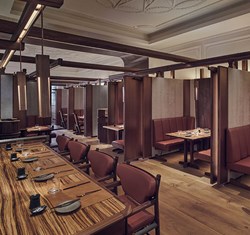 Dark wooden interiors in The Connaught Grill restaurant in Mayfair