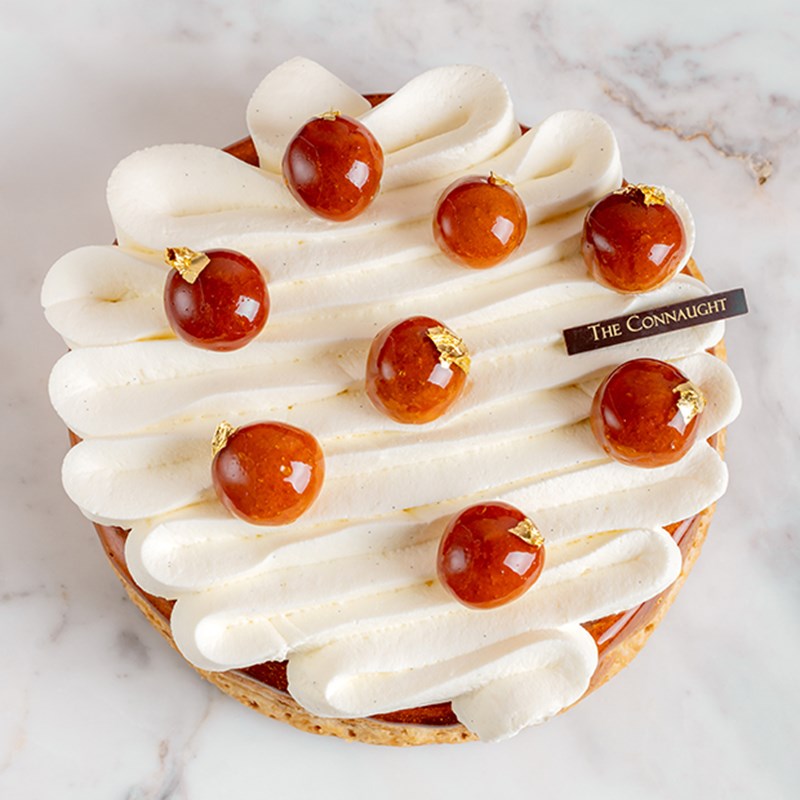 A Saint Honoré on a table at The Connaught Patisserie